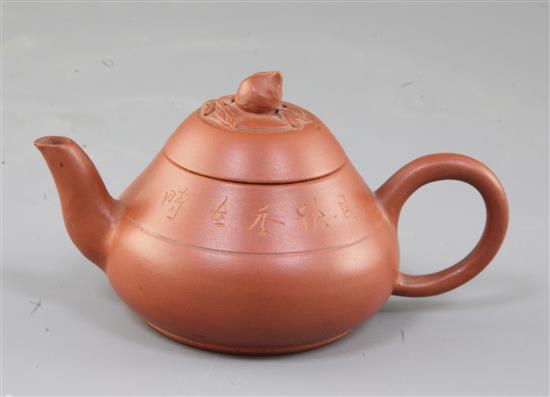 A Chinese Yixing pottery conical teapot and cover, 19th century, spout to handle 11.5cm